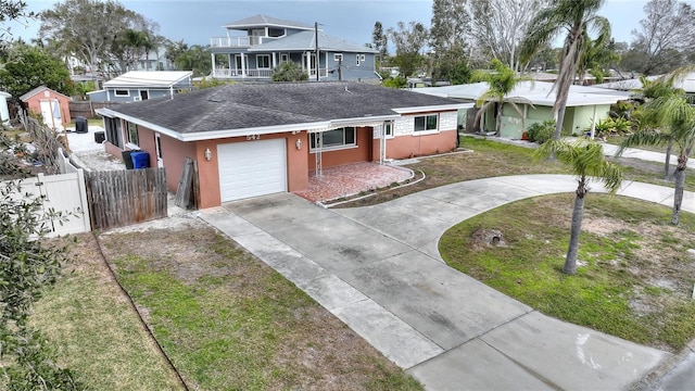 view of front of house with a front yard and a balcony