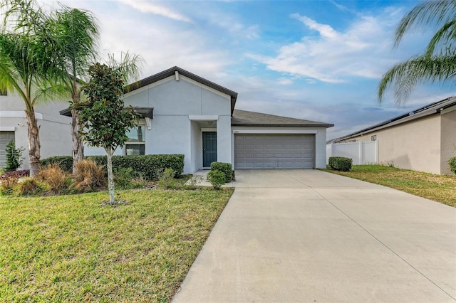 view of front facade featuring a garage and a front yard