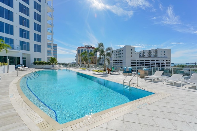 view of swimming pool featuring a patio