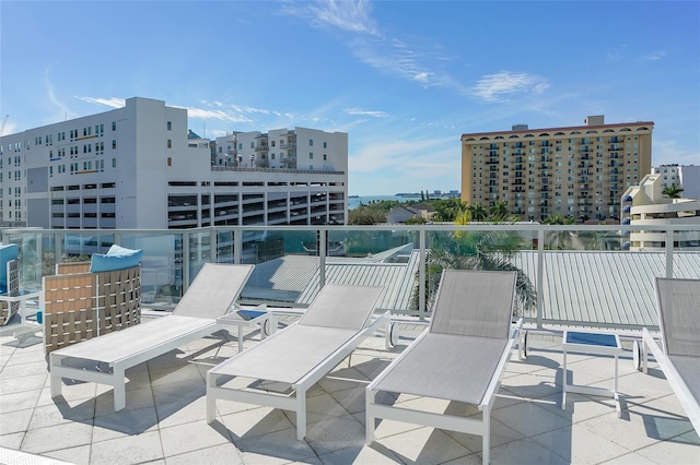 view of patio featuring a balcony