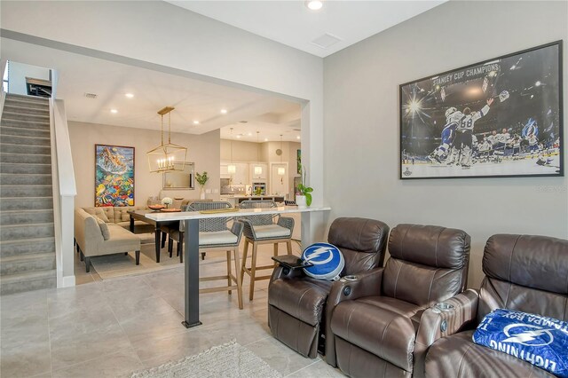 living room with a chandelier