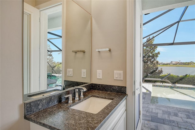 bathroom featuring a water view and vanity