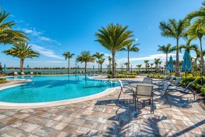 view of swimming pool with a patio area