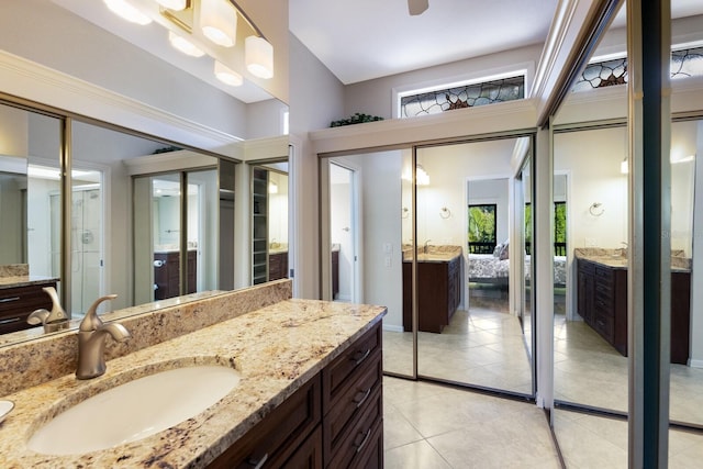 bathroom featuring vanity and tile patterned flooring