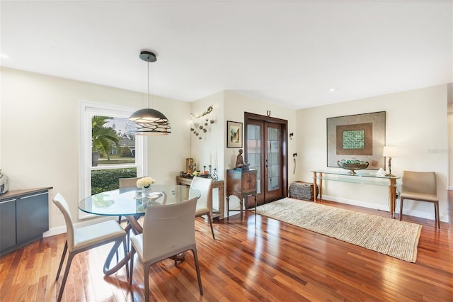 dining room featuring wood-type flooring