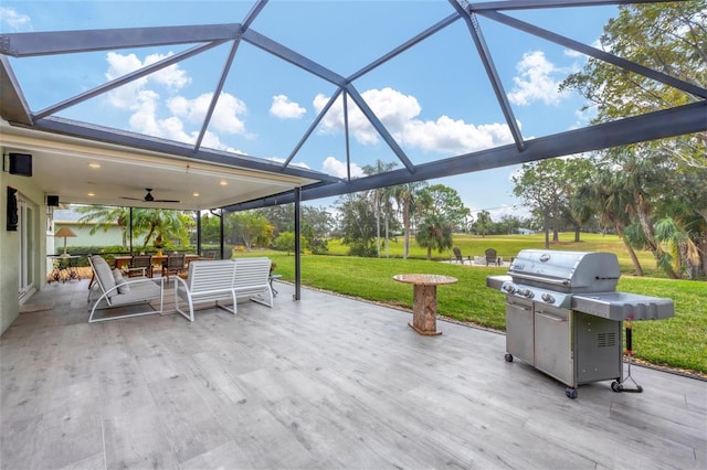 view of patio / terrace featuring a lanai and a grill