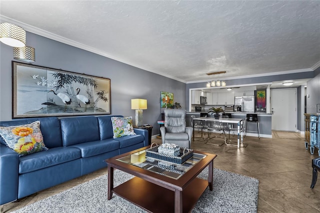 living room with ornamental molding and a textured ceiling