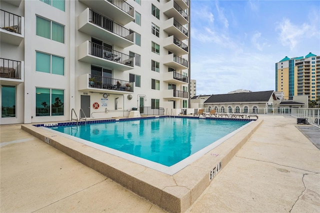 view of pool with a patio area