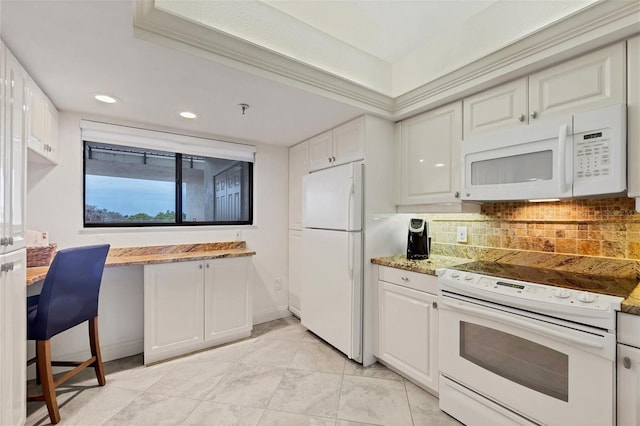 kitchen with tasteful backsplash, white cabinets, light tile patterned floors, and white appliances