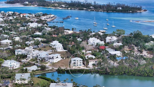 birds eye view of property featuring a water view