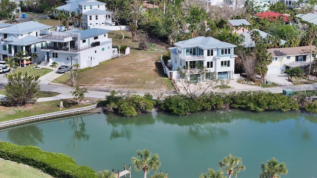 drone / aerial view with a water view