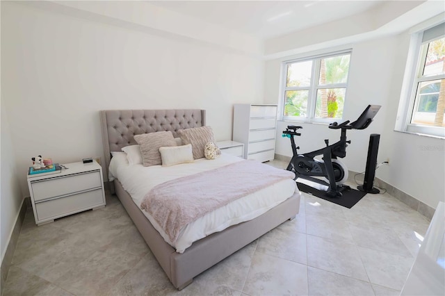 bedroom featuring multiple windows