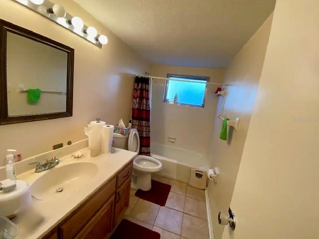 full bathroom featuring toilet, a textured ceiling, shower / bath combo with shower curtain, tile patterned floors, and vanity