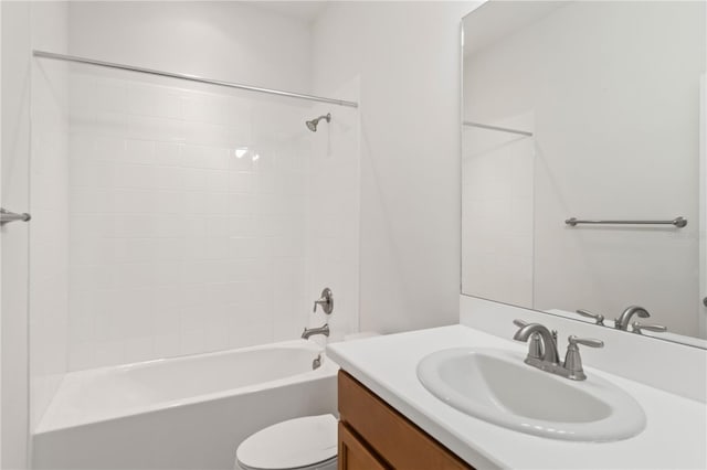 full bathroom featuring shower / tub combination, vanity, and toilet