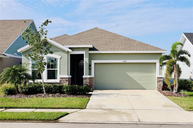 view of front of property with a garage