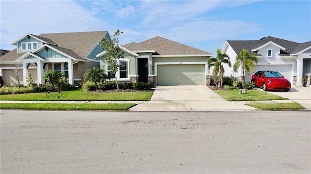 view of front of property with a front lawn and a garage