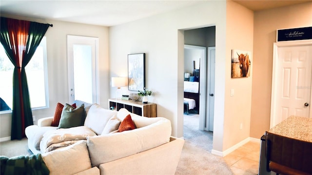 living room with light colored carpet