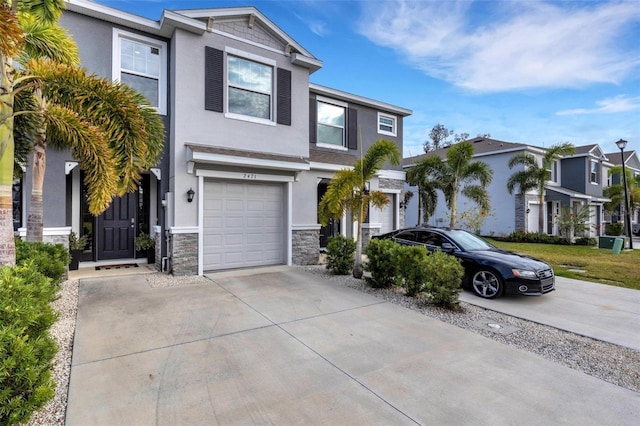 view of front of property with a garage