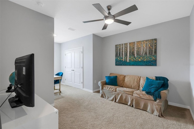 interior space with carpet and ceiling fan