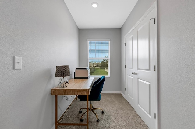 home office with carpet flooring