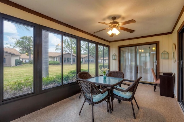 sunroom / solarium with ceiling fan