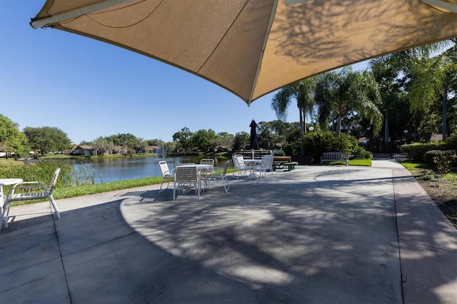 view of patio featuring a water view