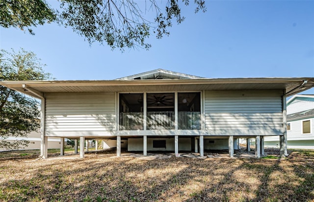 back of property featuring a sunroom