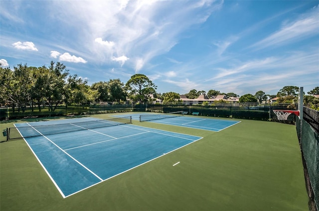 view of tennis court with basketball court