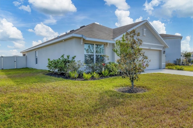 view of front facade featuring a garage and a front lawn