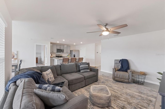 living room featuring ceiling fan