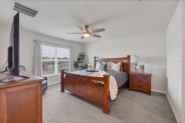 bedroom featuring ceiling fan and light colored carpet