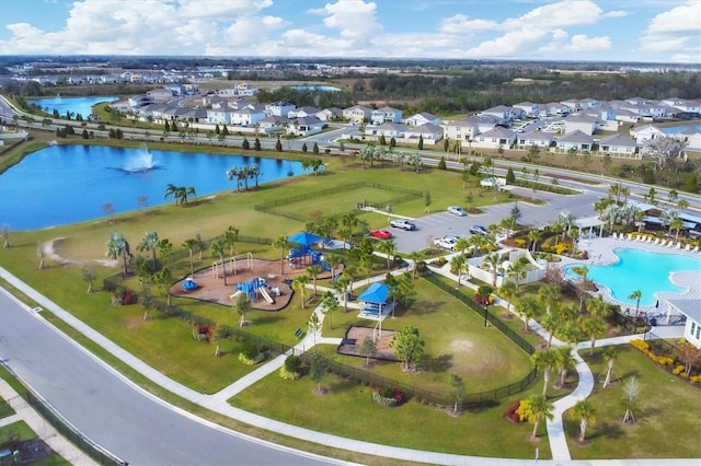 birds eye view of property featuring a water view