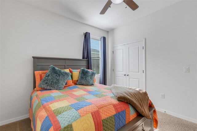 bedroom with carpet flooring, ceiling fan, and a closet