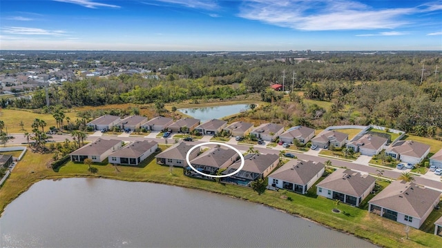 birds eye view of property featuring a water view