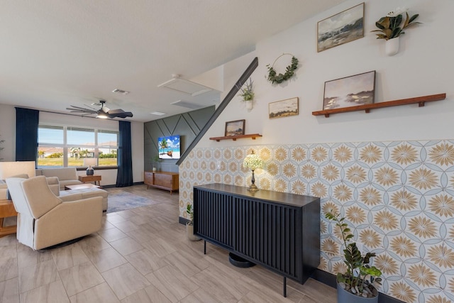 living room featuring ceiling fan