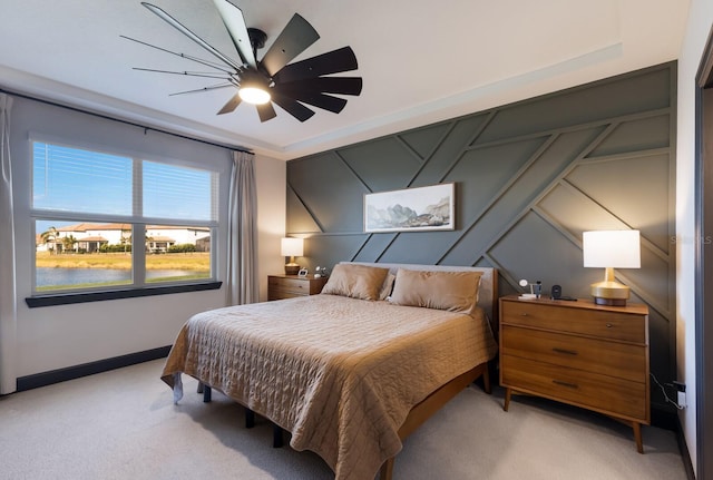 carpeted bedroom with ceiling fan