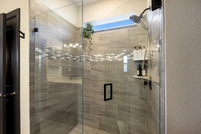 bathroom featuring an enclosed shower