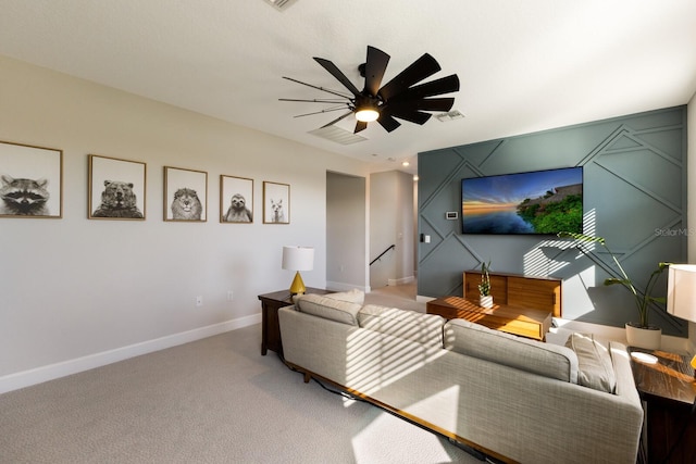 living room featuring ceiling fan and carpet floors