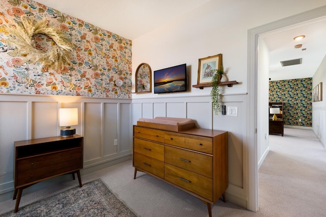 sitting room with light colored carpet