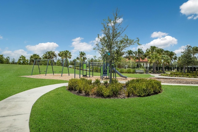 view of community with a playground and a lawn