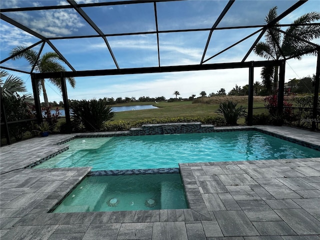 view of swimming pool with an in ground hot tub, a lanai, and a patio