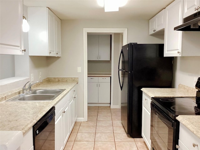 kitchen with sink, white cabinets, and black appliances