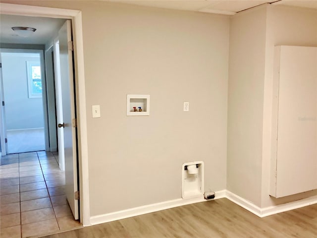 laundry area featuring light wood-type flooring and hookup for a washing machine