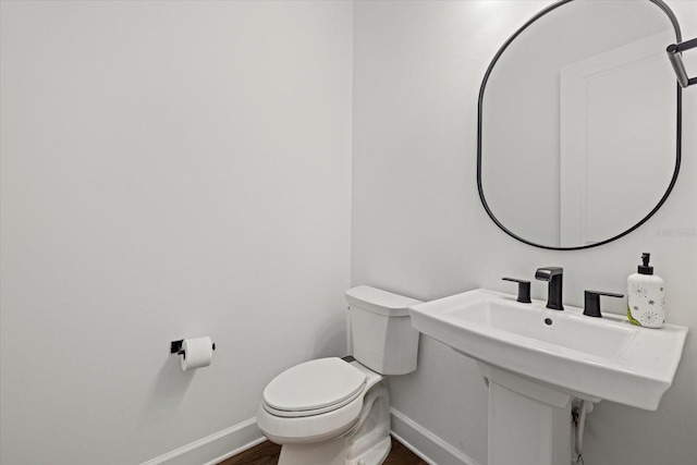 bathroom featuring toilet