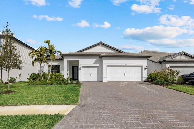 ranch-style house with a front yard and a garage