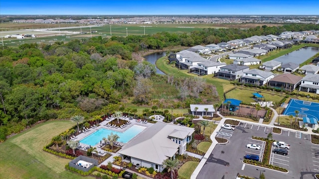 bird's eye view with a water view