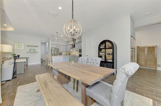 dining area featuring an inviting chandelier