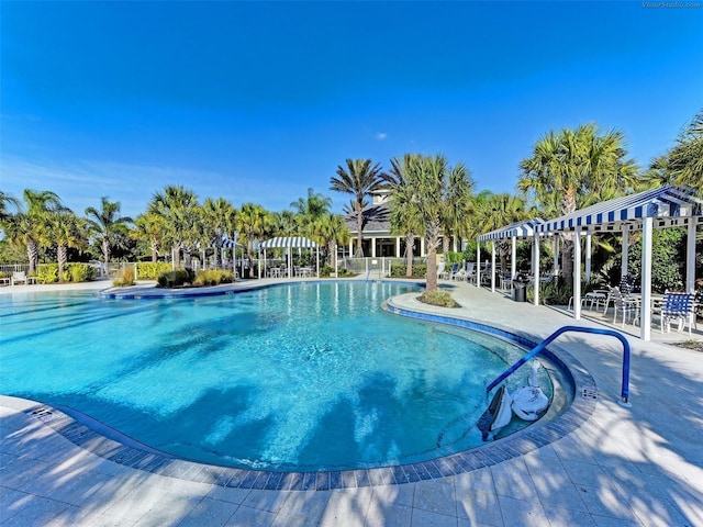 view of swimming pool featuring a patio area