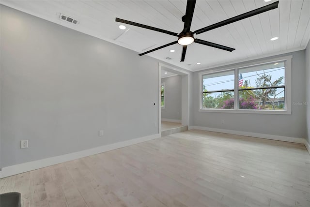 empty room with wooden ceiling, ceiling fan, and light wood-type flooring