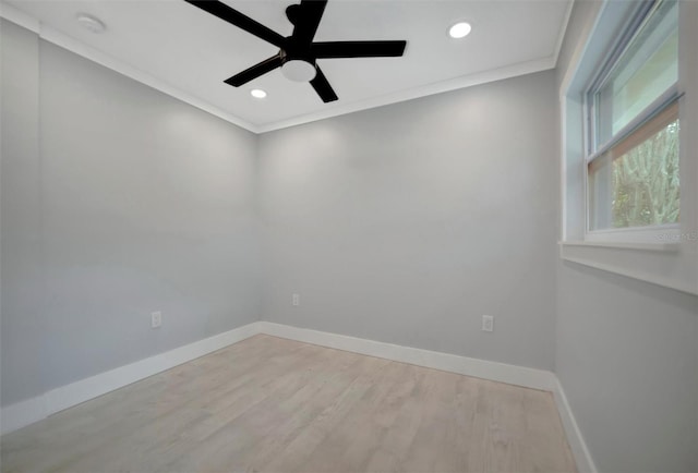 unfurnished room with ceiling fan, light hardwood / wood-style flooring, and crown molding